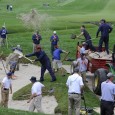Look at how many people are working on this bunker at Merion Golf Club on Monday