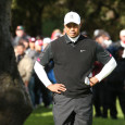 Tiger Woods blows four-shot lead with eight holes to go to Zach Johnson at his own tournament