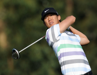 Anthony Kim hits a tee shot during a 2012 tournament.  (Getty Images)